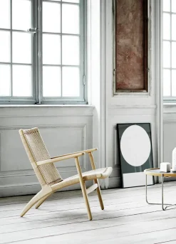 CH25 Loungestol, eg sortmalet med naturflet af Hans J. Wegner