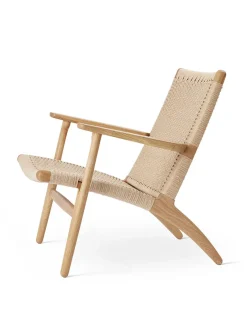 CH25 Loungestol, eg sortmalet med naturflet af Hans J. Wegner