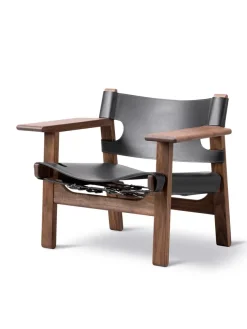 Den Spanske Stol i mørkebrun læder, eg sæbe af Børge Mogensen