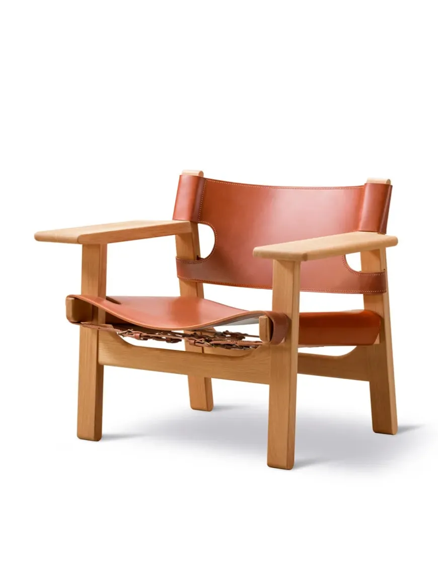 Den Spanske Stol i sort læder, valnød olie af Børge Mogensen