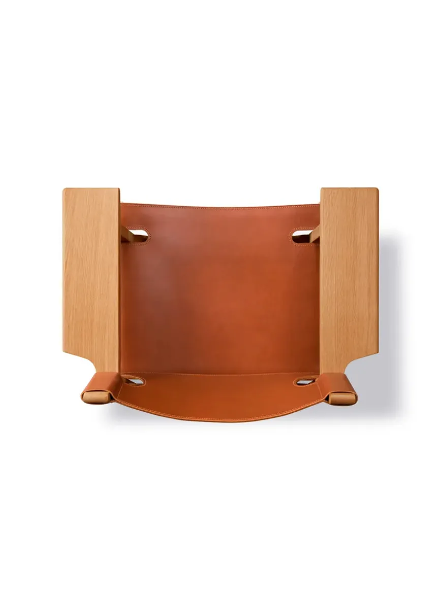 Den Spanske Stol i sort læder, valnød olie af Børge Mogensen