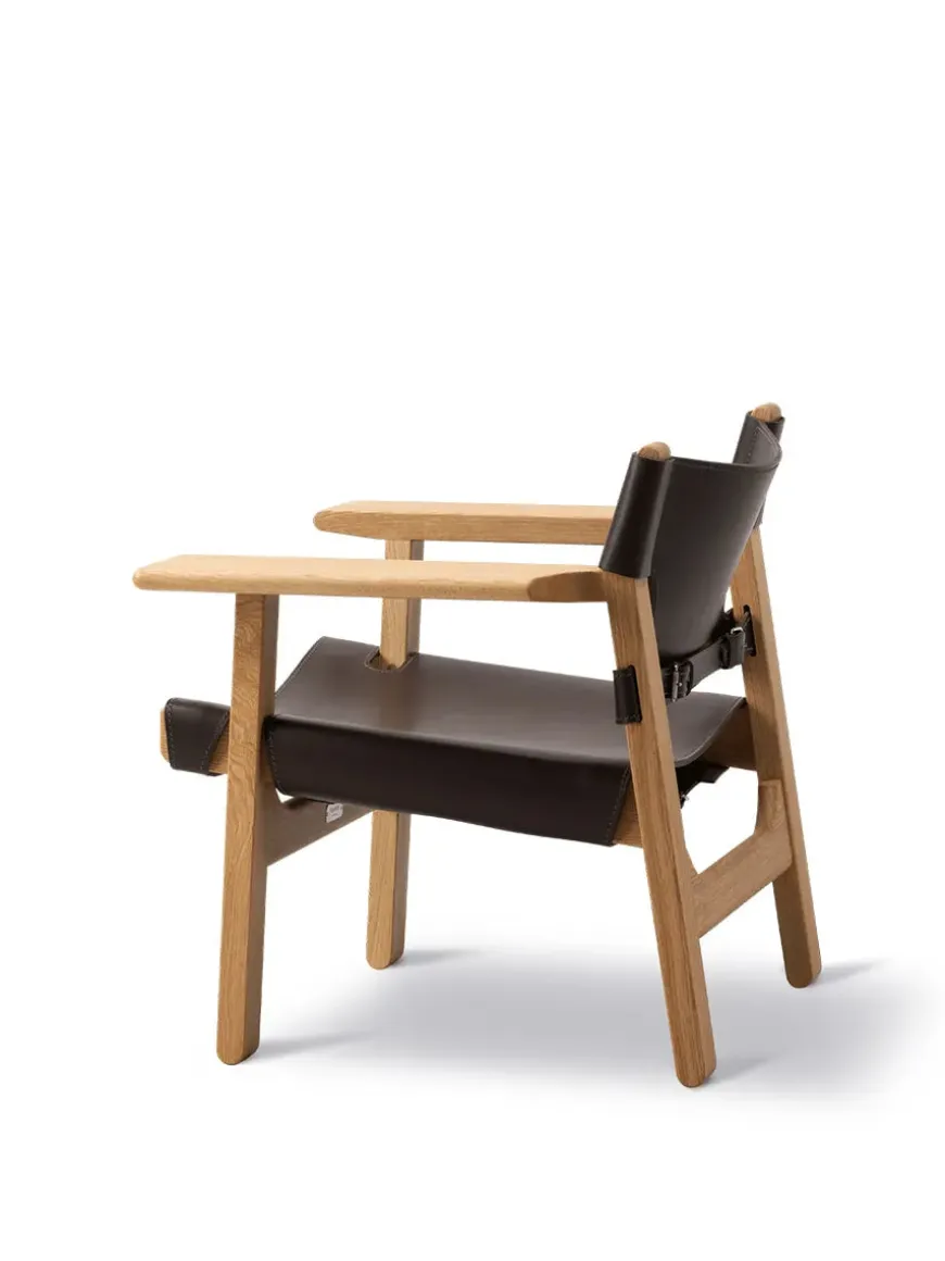 Den Spanske Stol i sort læder, valnød olie af Børge Mogensen