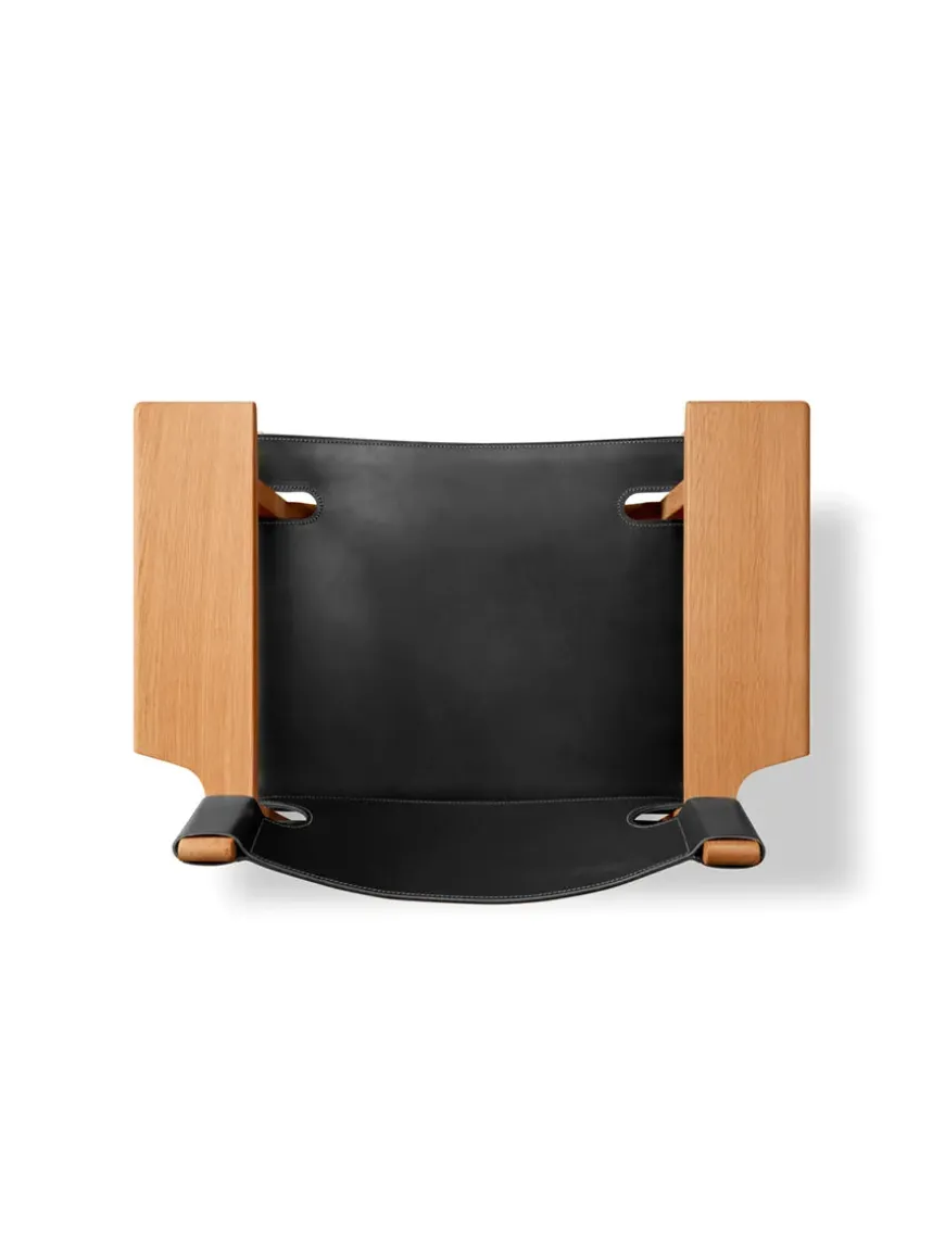 Den Spanske Stol i sort læder, valnød olie af Børge Mogensen