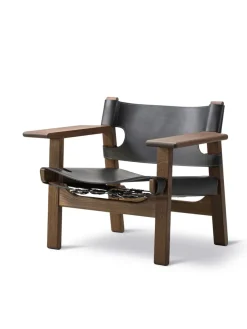 Den Spanske Stol i sort læder, eg sort lak af Børge Mogensen