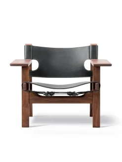 Den Spanske Stol i sort læder, eg sort lak af Børge Mogensen