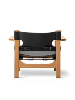 Den Spanske Stol i sort læder, eg olie af Børge Mogensen