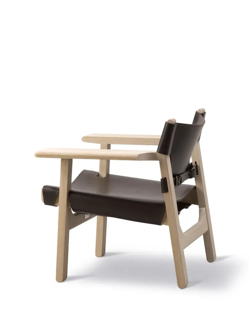 Den Spanske Stol i sort læder, eg olie af Børge Mogensen