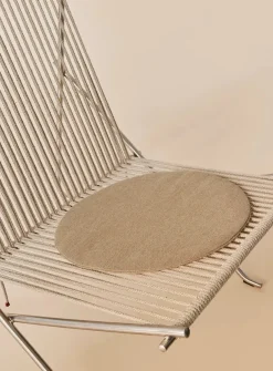 PK4 Loungestol i natur, stålstel af Poul Kjærholm