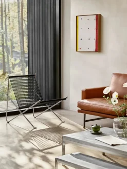 PK4 Loungestol i natur, stålstel af Poul Kjærholm