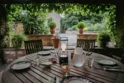 The Muse Portable Lampe, Pomona Red fra Tala